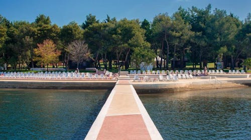 Apartmaji Polynesia Plava Laguna - Poletje v Istri, Umag, Istra, Hrvaška - 152 EUR - 2x nočitev v Studio Economy apartmaju 2+1 park stran za 3 osebe, Uporaba zunanjega bazena za odrasle in bazena za otroke