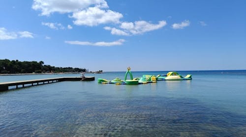 Apartmaji Polynesia Plava Laguna - Poletje v Istri s polpenzionom , Umag, Istra, Hrvaška - 912 EUR - 5x nočitev v Studio Economy apartmaju 2+1 park stran za 2 osebi (otrok do 4,99 let brezplačno), Polpenzion (zajtrk in večerja)